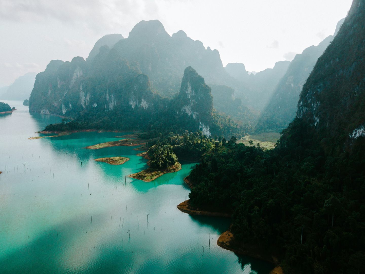 Khao Sok limestone karsts rising from Cheow Lan Lake